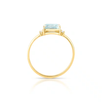 Anel em ouro amarelo com topázio azul retangular 6x4 mm e diamante