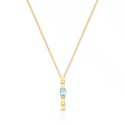 Pingente retangular em ouro amarelo com topázio azul oval e diamante.