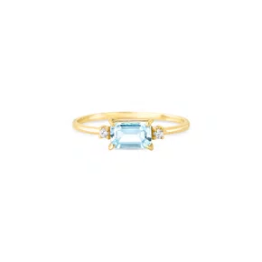 Anel em ouro amarelo com topázio azul retangular 6x4 mm e diamante